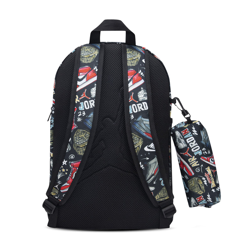 Black backpack with molded back panel, mesh straps, and pencil case