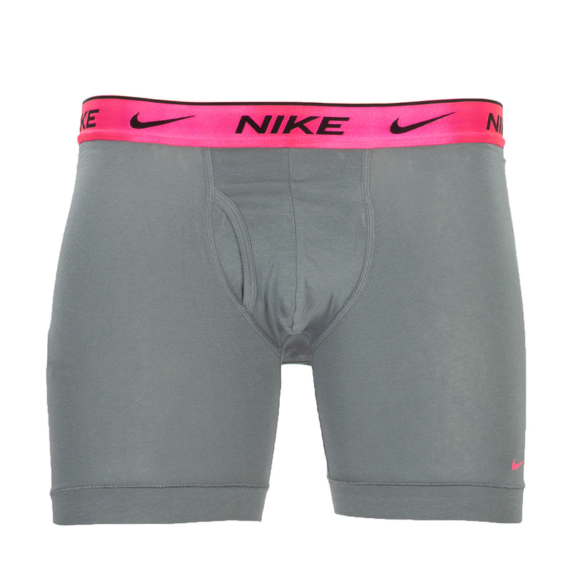 Grey Dri-FIT boxer briefs with pink Nike logo waistband, cotton-stretch fit.
