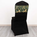 Black chair cover with green and gold sequined design on the back.