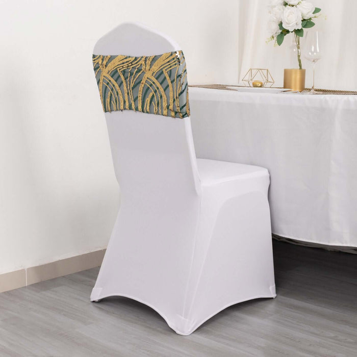 Elegant white chair cover with decorative green and gold sash.