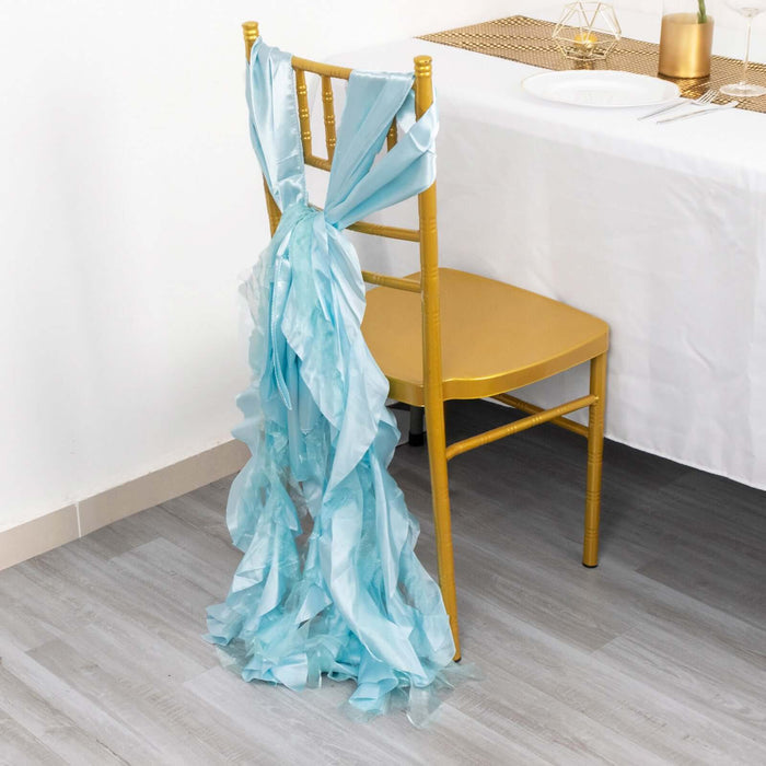 Light blue chair sash elegantly draped on a gold chair at a dining table.