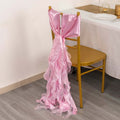 Pink chair sash with flowing ruffles for elegant decor.
