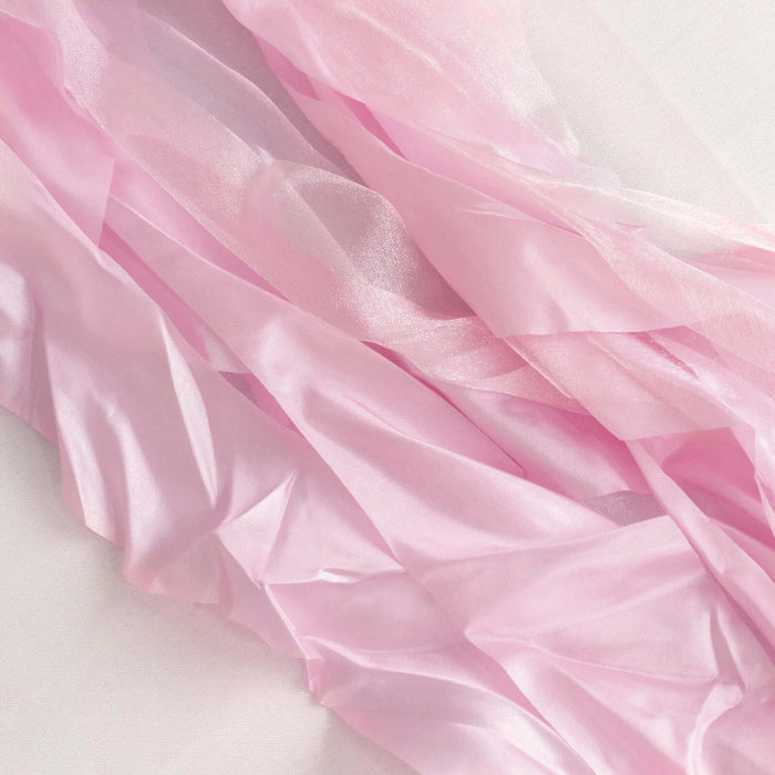 Pink satin ribbons draped elegantly on a white backdrop. #whtbkgd