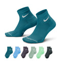 Pair of teal quarter crew socks with white Nike swoosh on ankle