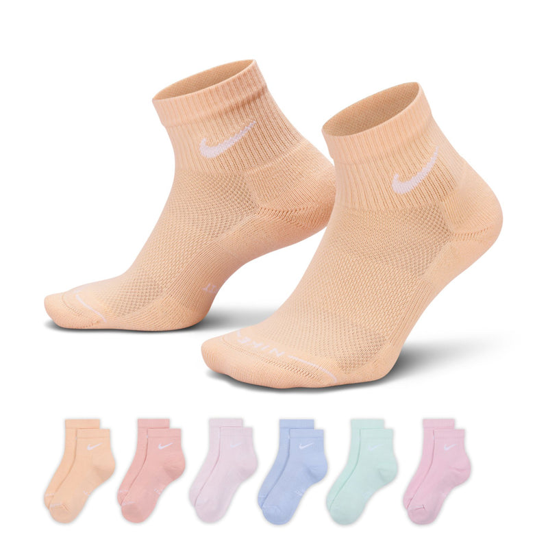 Peach quarter socks, ribbed knit with white Nike swoosh