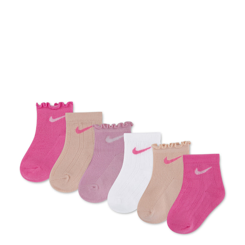 6-pack infant ankle socks in pink, beige, lavender, and white with Nike swooshes