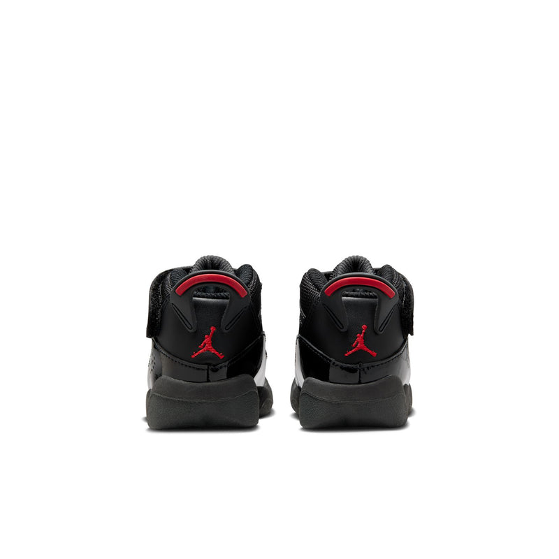 Black toddler sneakers rear view with red heel pull tabs and Jordan logo details.