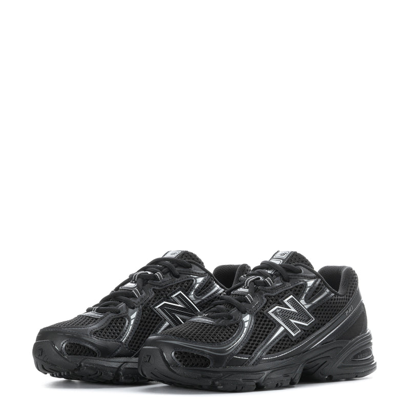 Youth black lace-up sneakers with twin silver N logos and mesh quarter panels