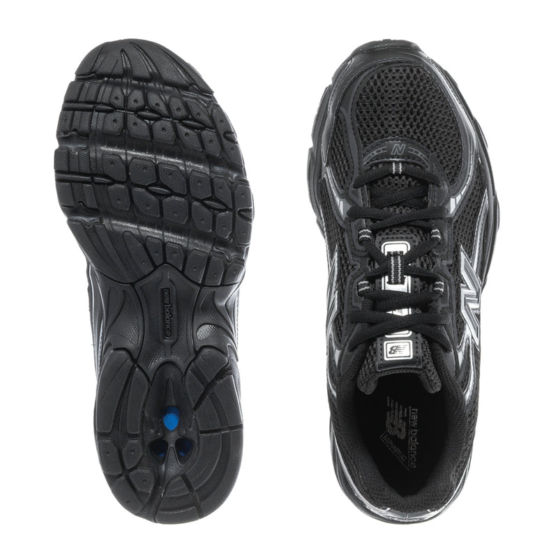 Youth black sneakers, rubber outsole tread and inside heel padding
