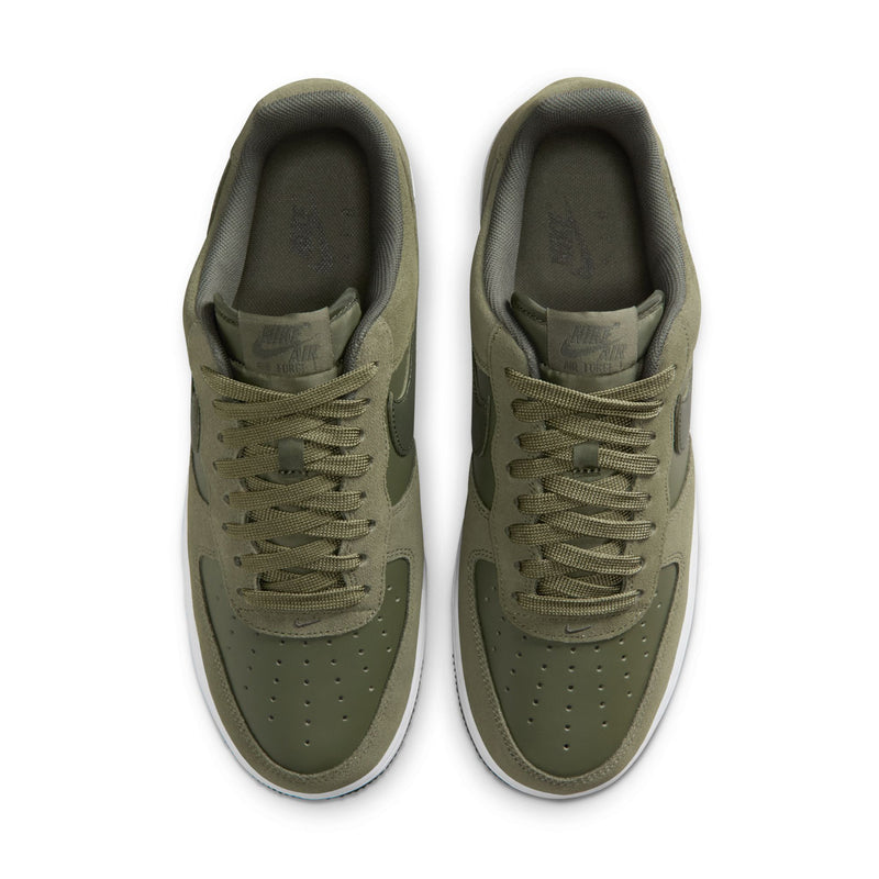 Men's low-top sneakers in olive suede with lace rows and padded collars, white outsole edge.