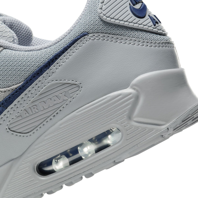 Air Max 90 men's sneaker close-up of navy midfoot line and clear air window