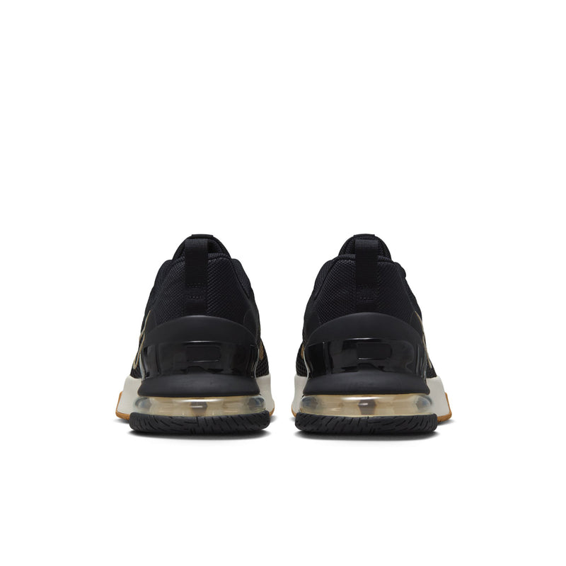Black sneakers rear view with air-cushion heel and gold trim