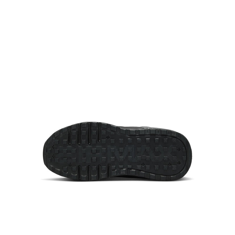 Kids black sneaker outsole with grippy traction tread pattern