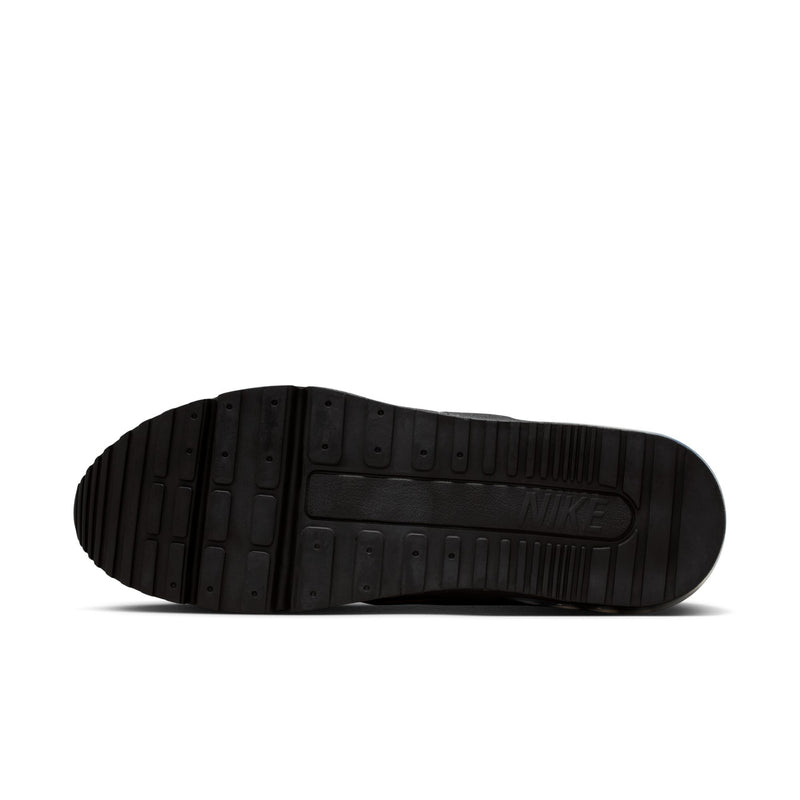 Black rubber outsole with tread pattern and NIKE logo on the heel