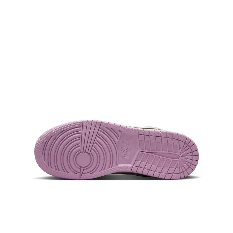 Youth sneaker outsole in light purple-pink with textured tread and circular traction lines