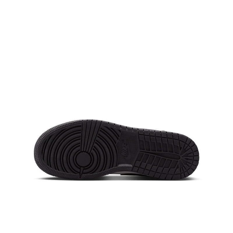 Youth sneaker outsole, black tread with circular pattern and grid pods
