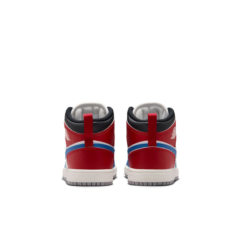 Kids AJ 1 mid-top sneakers, back view with red heel panels and blue cross overlay