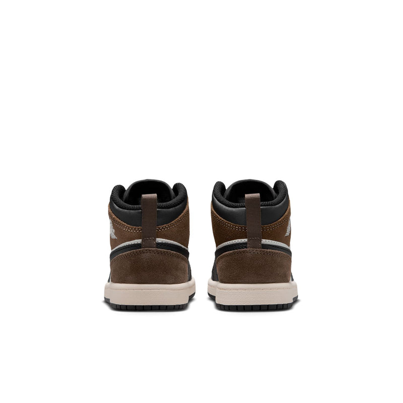 Kids mid-top sneakers heel view with brown suede and black lining, white outsole