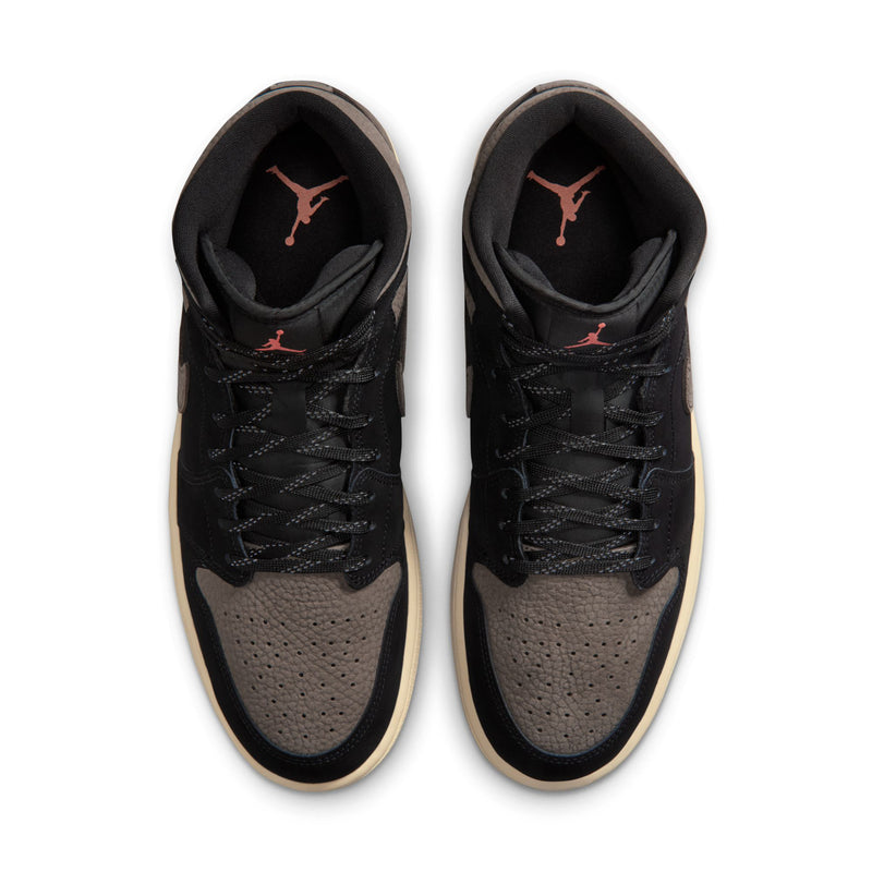 Black and olive grey mid-top sneakers with lace-up front and red Jordan logo on tongues.