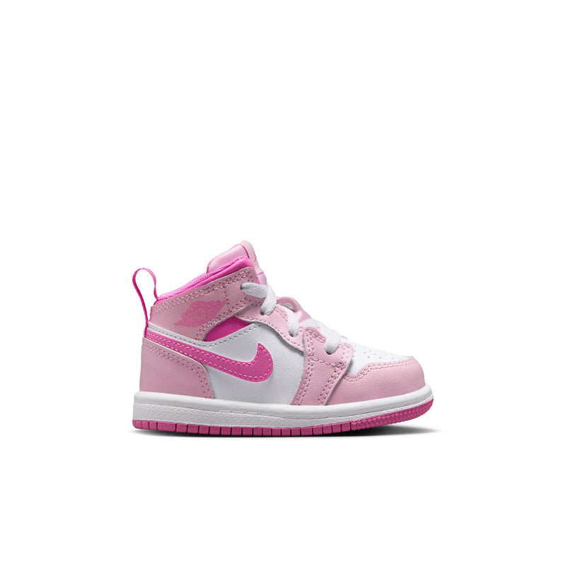 Pink and white toddler high-top sneaker, side angle with lace-up and swoosh