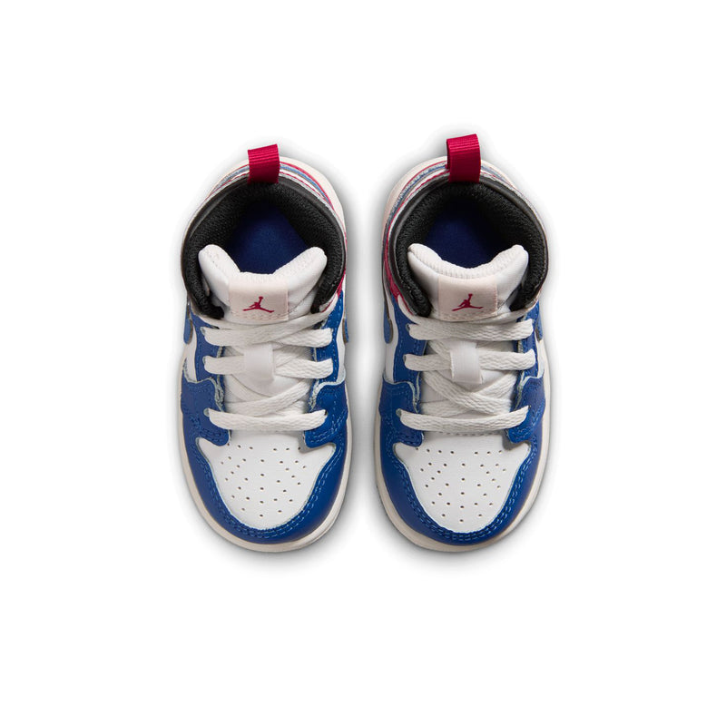 Kids' sneakers front view with blue toe, white laces, and red collar pull tabs