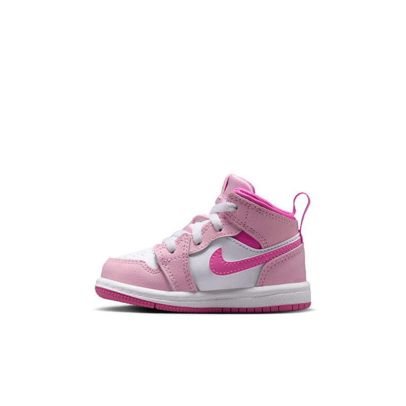 Pink and white toddler high-top sneakers, side view with pink swoosh and laces