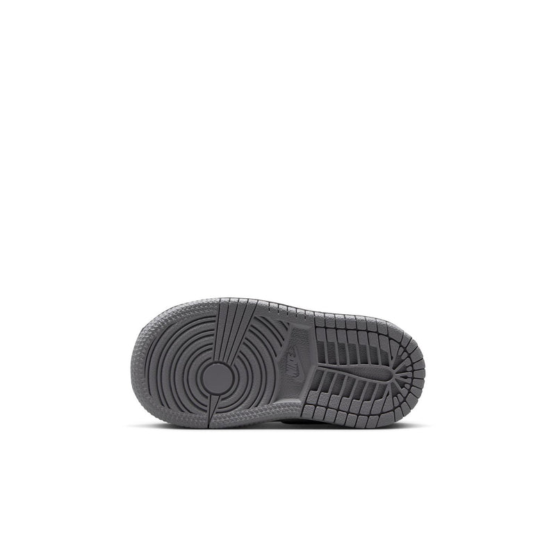 Kids' sneaker outsole view with gray rubber tread pattern