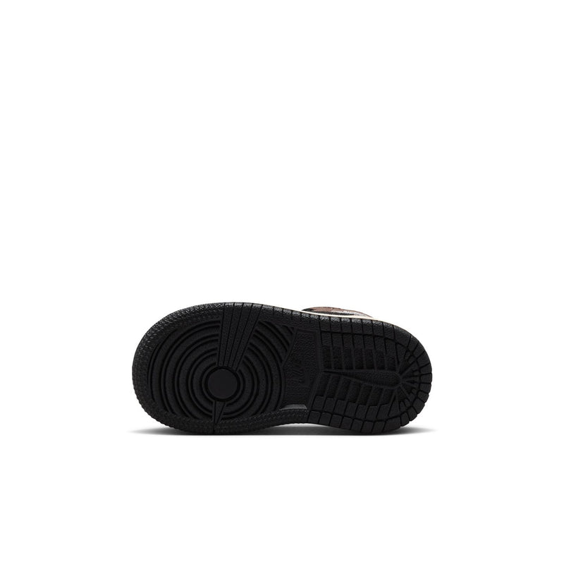 Toddler mid-top sneakers outsole with textured black rubber tread