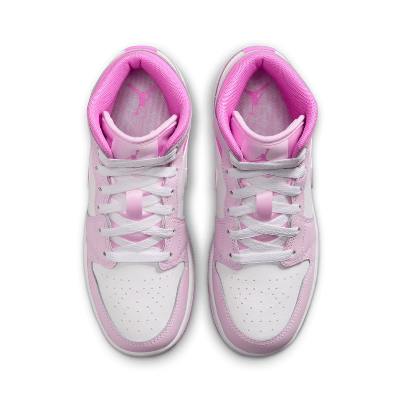 Pair of youth sneakers from above, white uppers with pink lining and lace panel