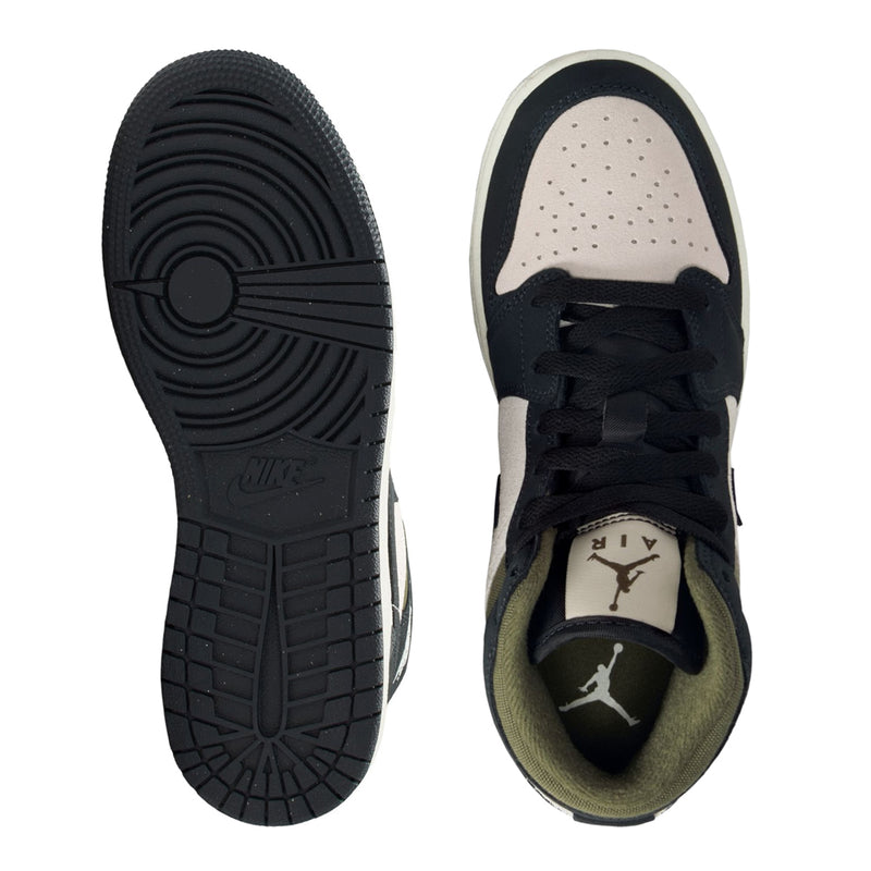Youth mid-top sneakers, outsoles and insides shown with black tread and Jumpman logos
