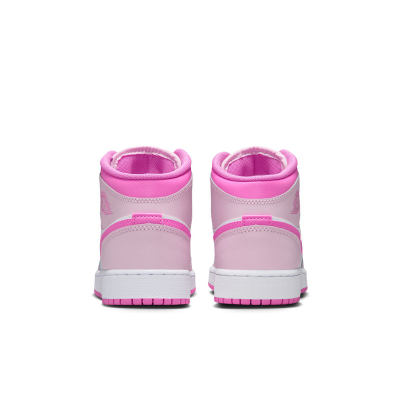 Youth mid-top sneakers with pink collars and white midsoles, back view