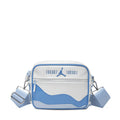 Blue and white zippered crossbody bag with Jumpman logo and adjustable shoulder strap