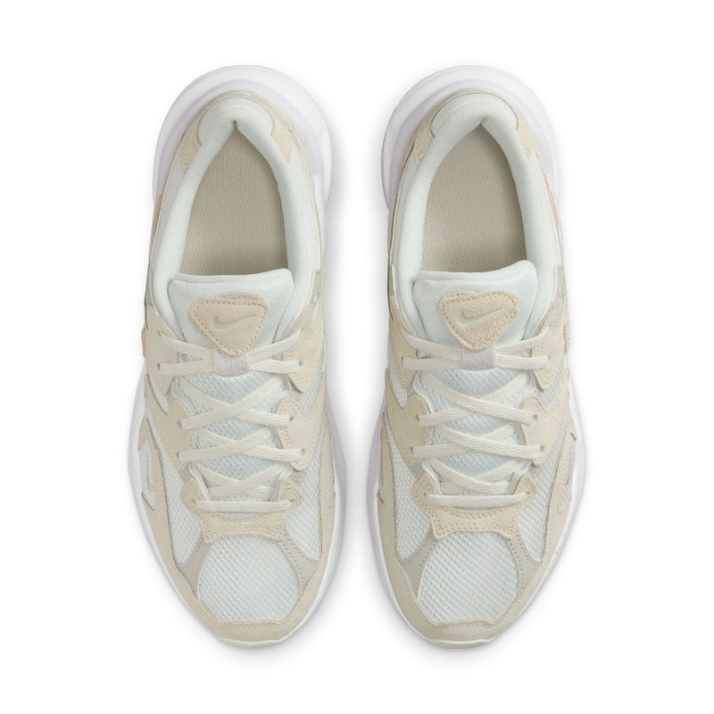 Light bone sneaker with white laces and beige interior collar padding, top view