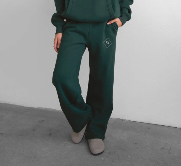 Flat lay of the full fleece set including hoodie and pants in navy blue.