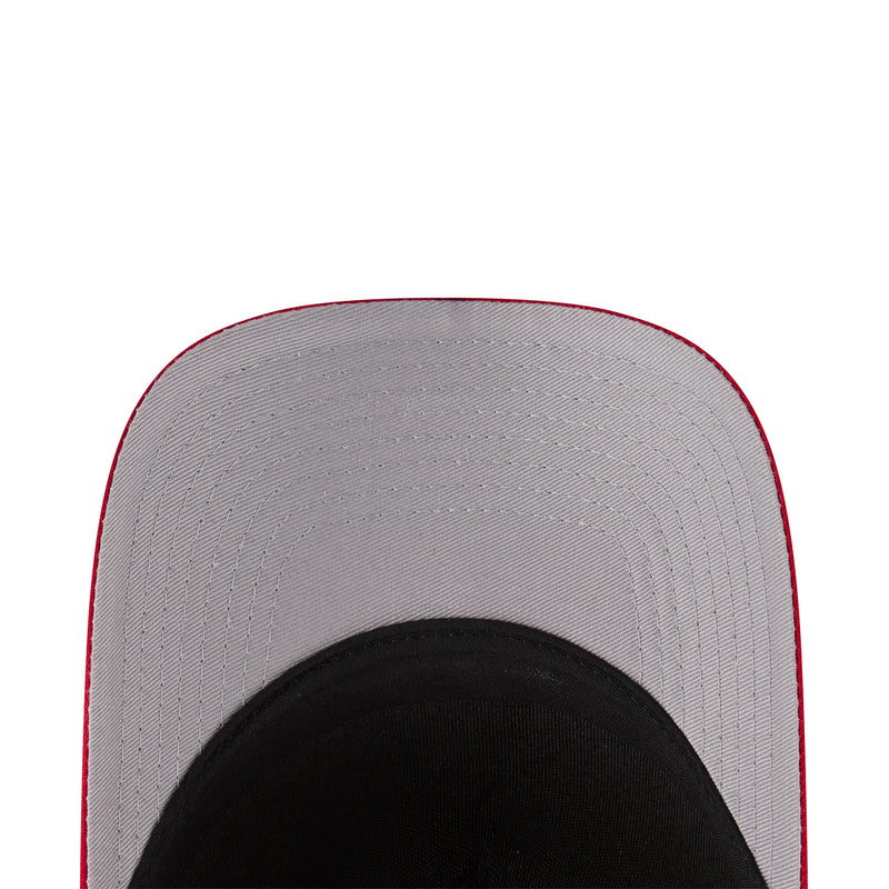 Baseball cap inner crown in gray with black interior lining under the brim.