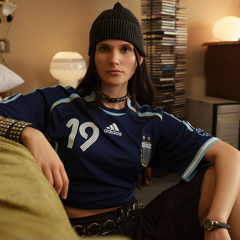 Women's dark blue Argentina jersey with crest, adidas logo, and number 19 on chest