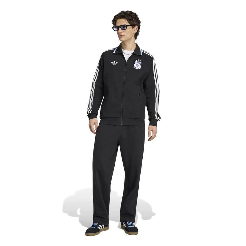 Mens black track jacket with white sleeve stripes and ribbed cuffs, full-length view