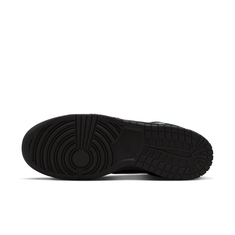Black Nike low-top sneaker outsole with detailed rubber tread.