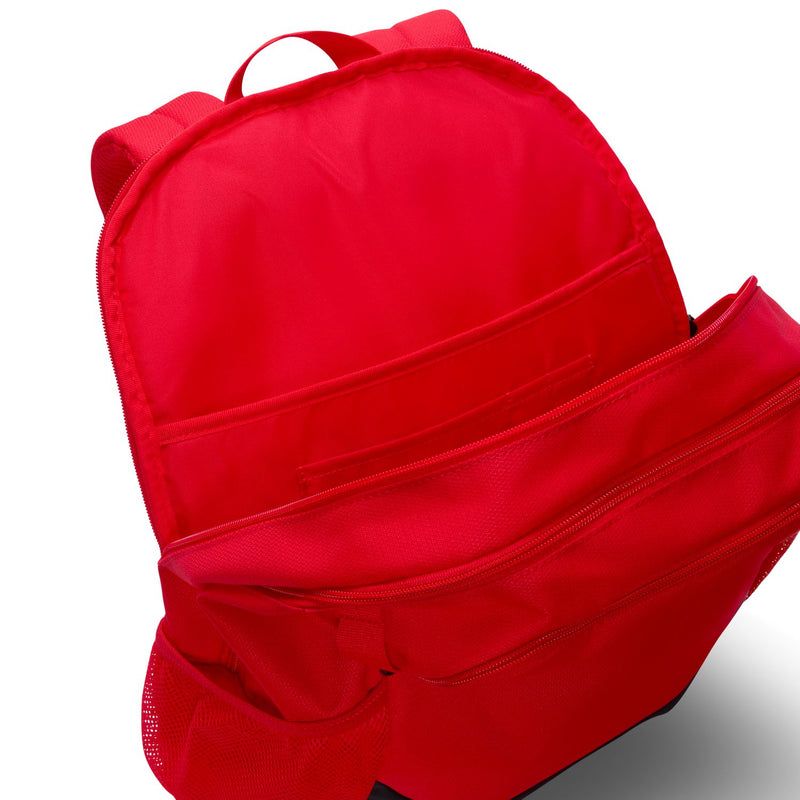 Red backpack with zipper closure, front carry handle, and textured side pocket panel.