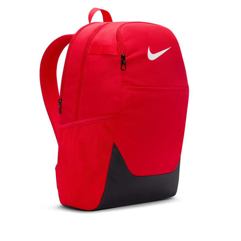 Red backpack with Nike swoosh, adjustable shoulder straps, and black lower panel.