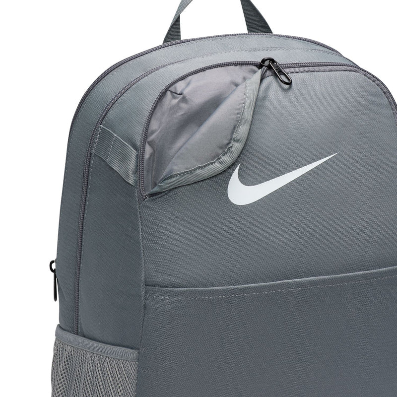 Nike Brasilia medium backpack close-up with top zip pocket and white swoosh