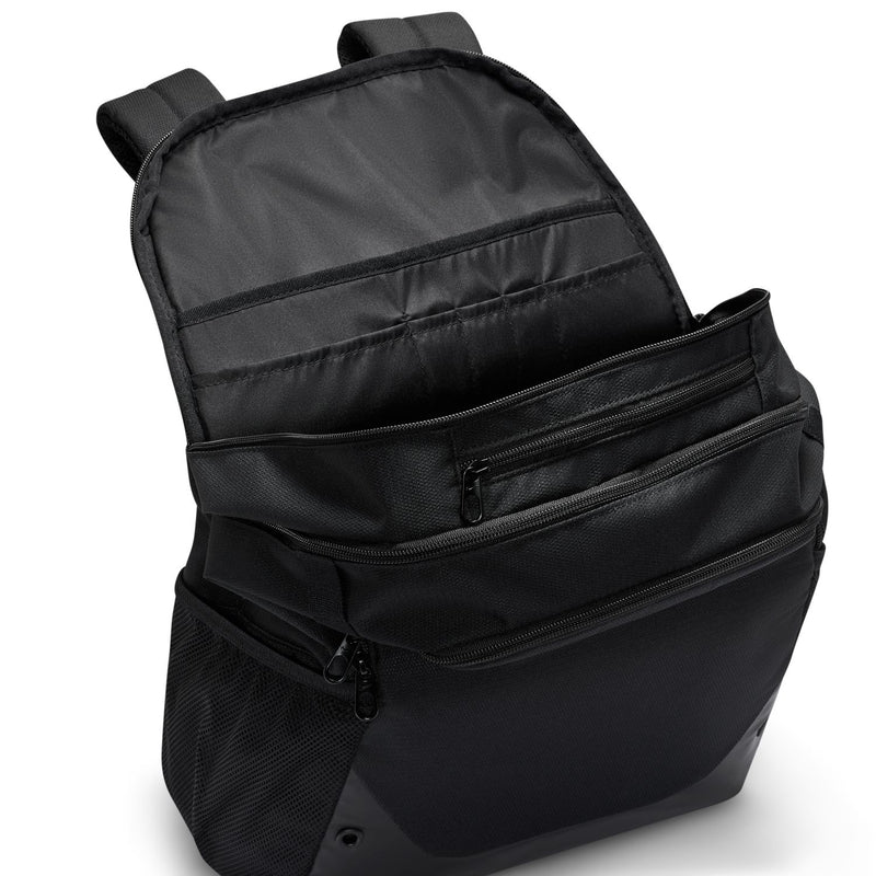 Nike Brasilia backpack corner view with zip front pocket, mesh side panel, black straps.