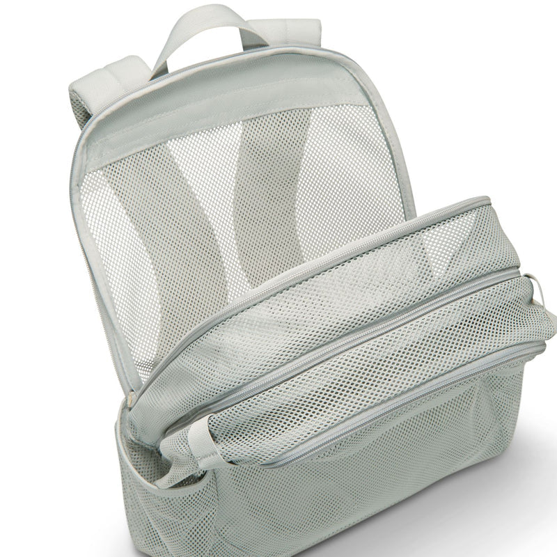 Light smoke grey mesh backpack with wide front zipper pocket and cushioned side panels.