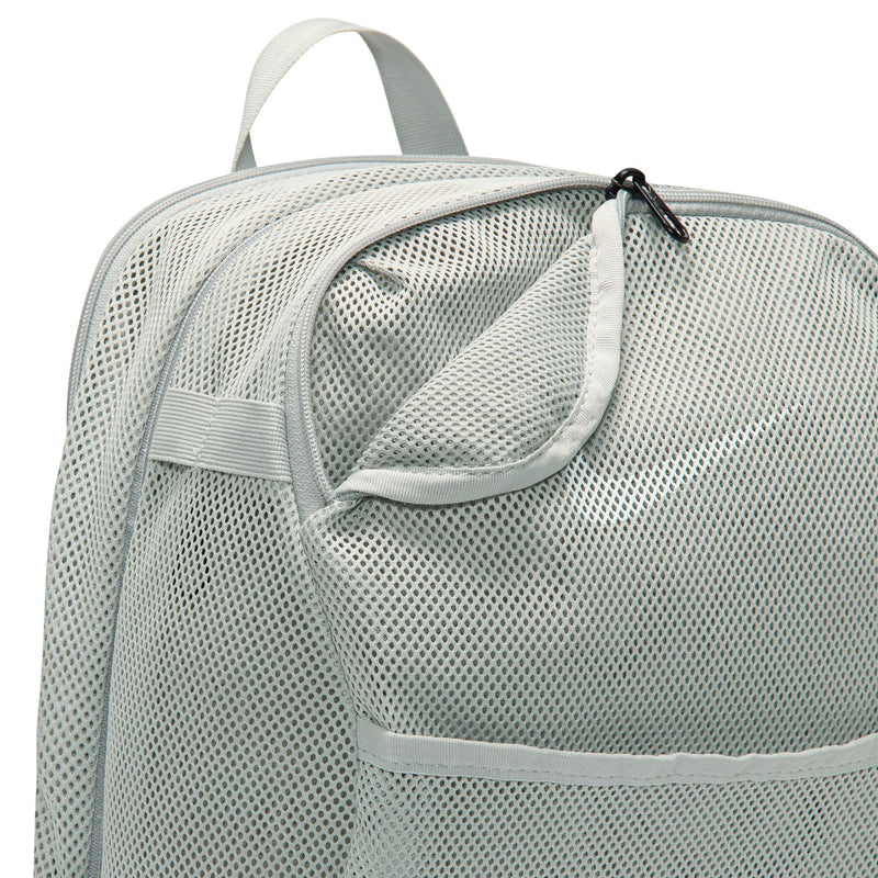 Light smoke grey mesh backpack close-up with front organizer pocket and zipper pull.