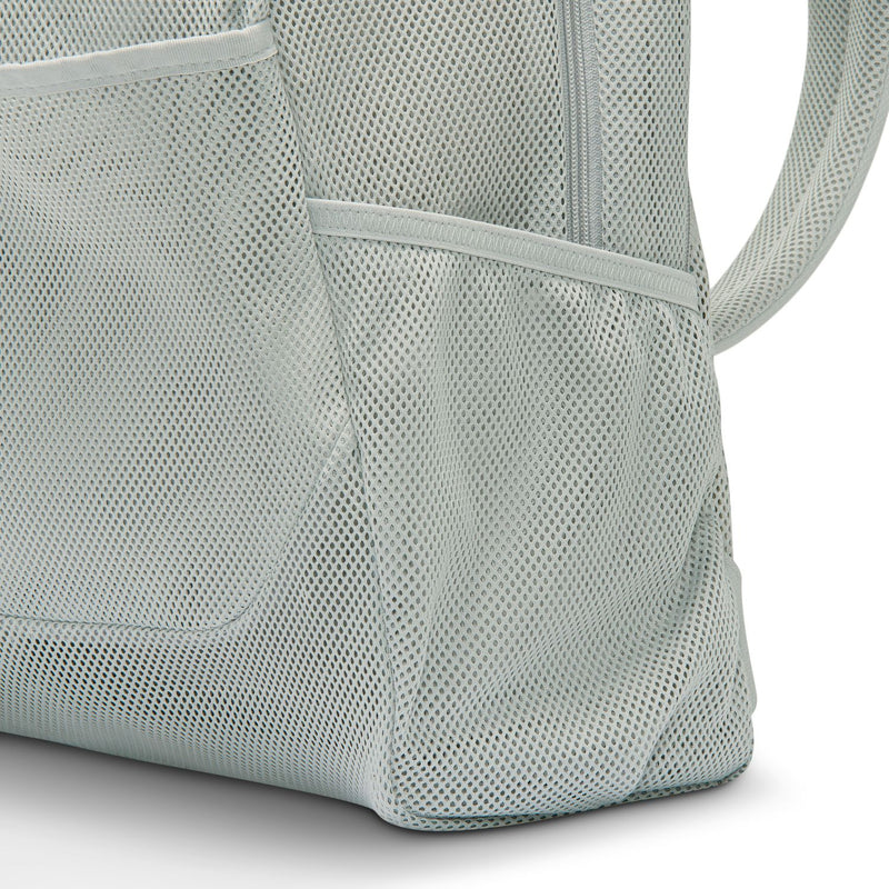 Light smoke grey mesh backpack side pocket panel with woven texture and stitched seams.