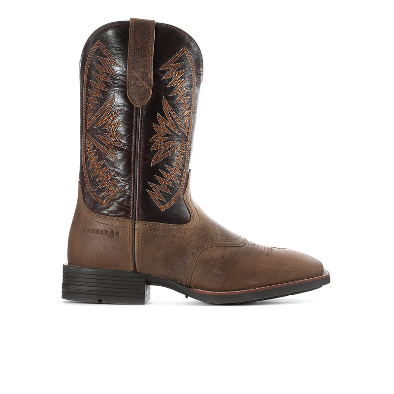 Tan leather cowboy boots with dark embroidered sides and brown pull strap, black heel