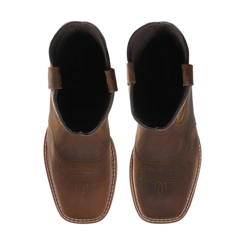 Men's brown western boots with pull tabs and black-lined interior