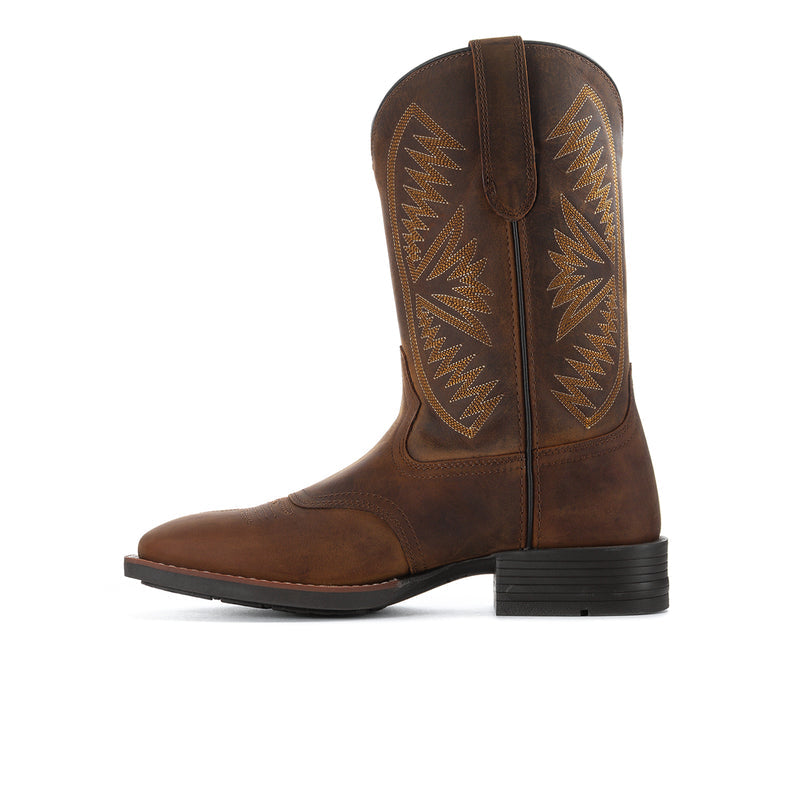 Men's brown western boots with embroidered shafts and pull-on design