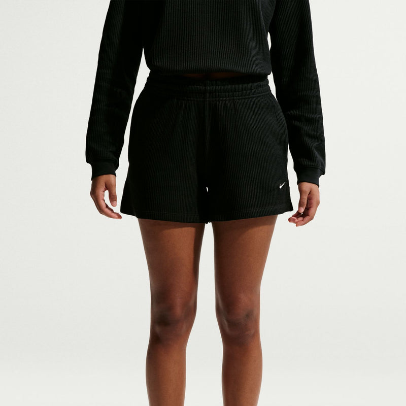 Black waffle-knit womens pull-on shorts, view from back with elastic waistband