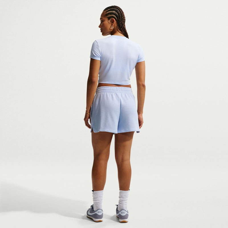 Women’s light blue knit waffle shorts from the back, above-knee length